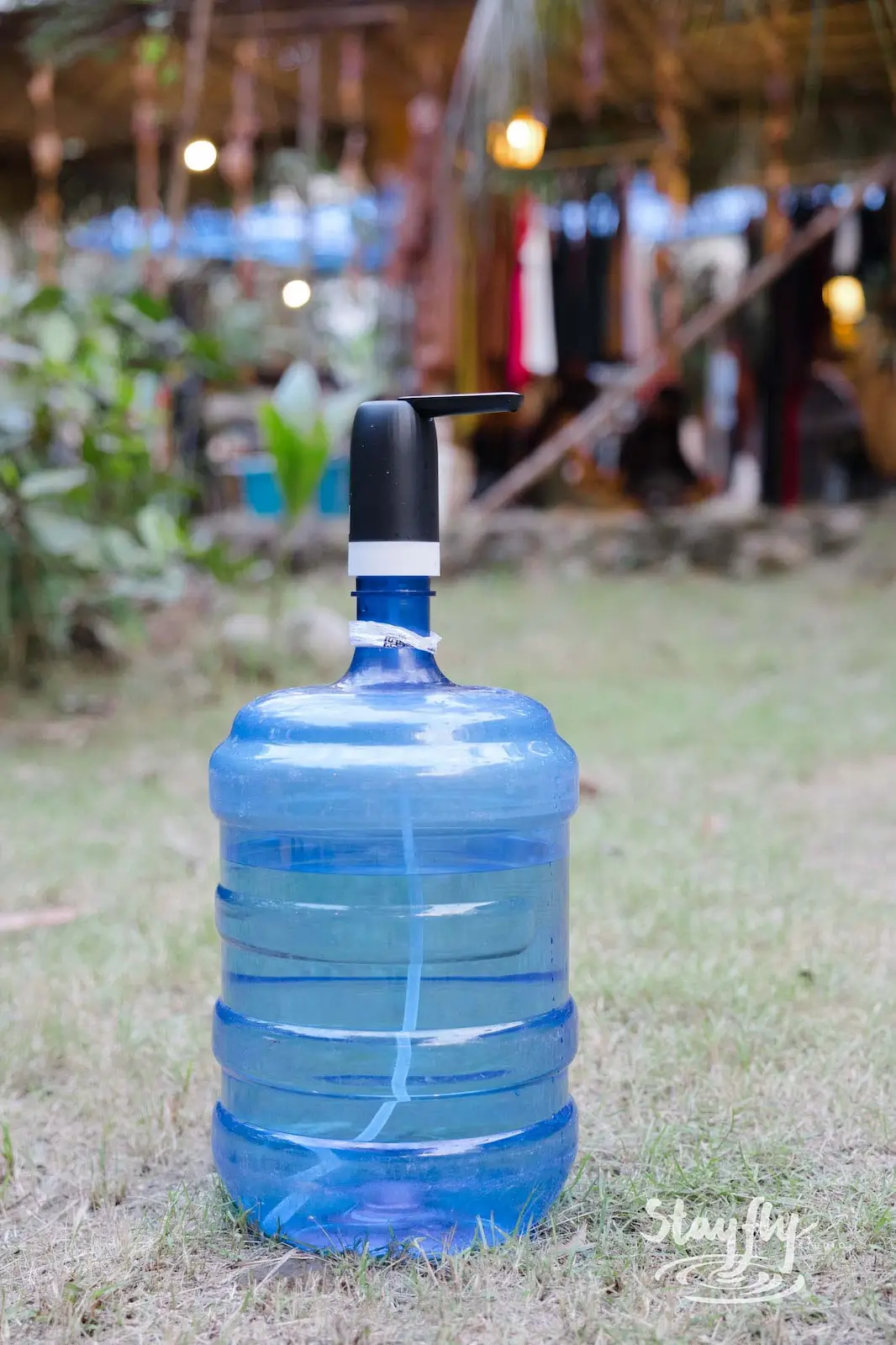 Large water jug with pump dispenser.