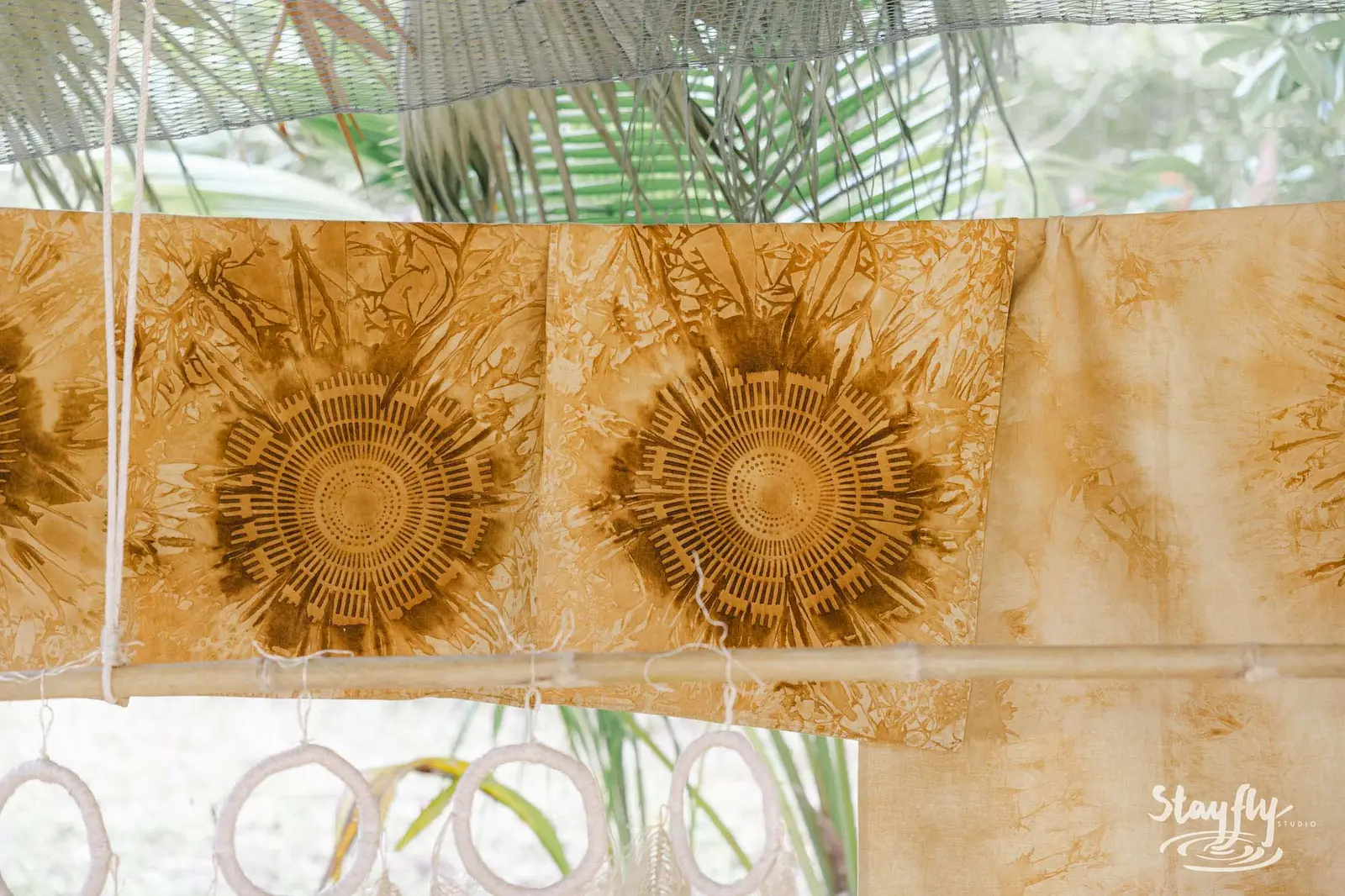 Sunflower-printed fabric craft panels close-up.