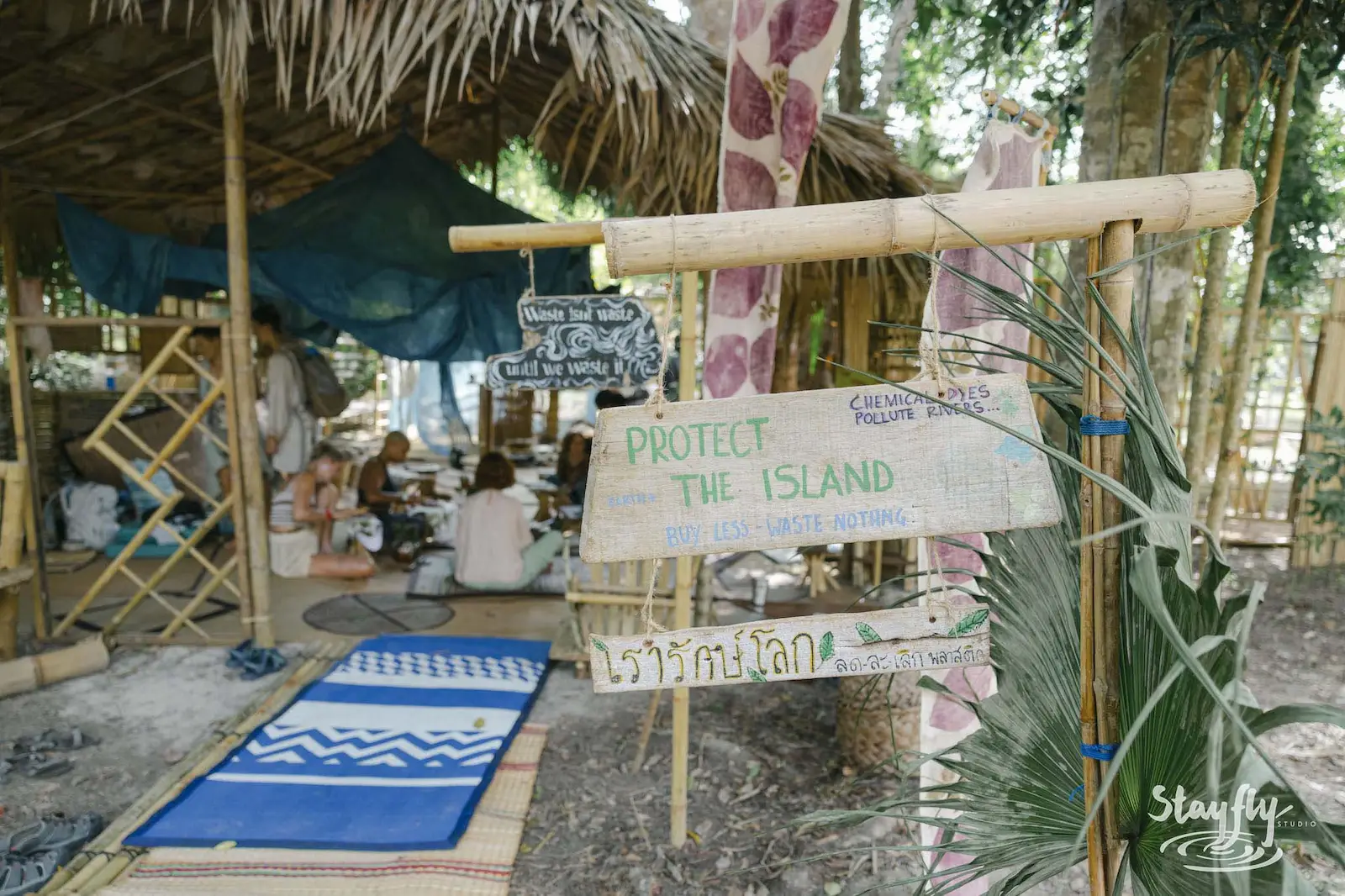 Protect the Island sign at bamboo craft area.