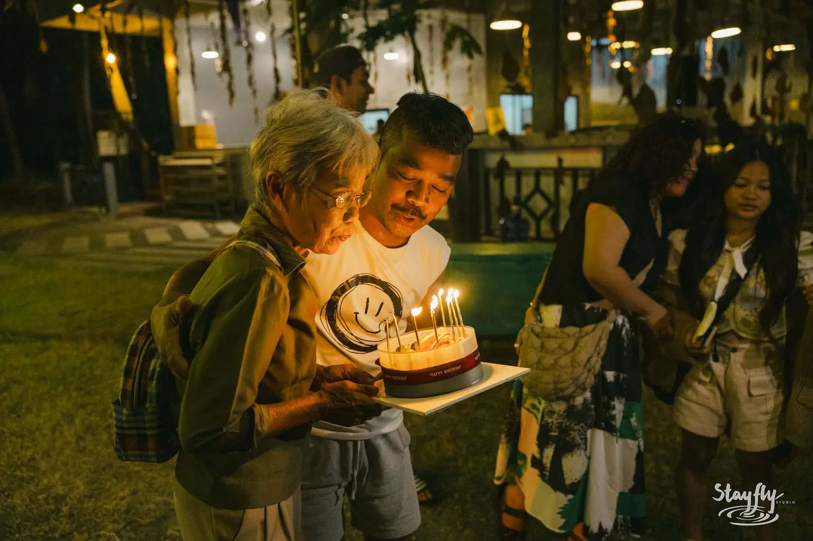 Birthday cake celebration with candles.