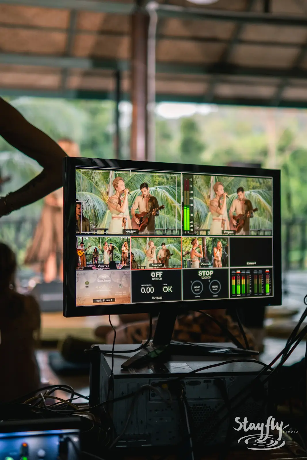 Broadcast monitor displays multiple camera feeds.
