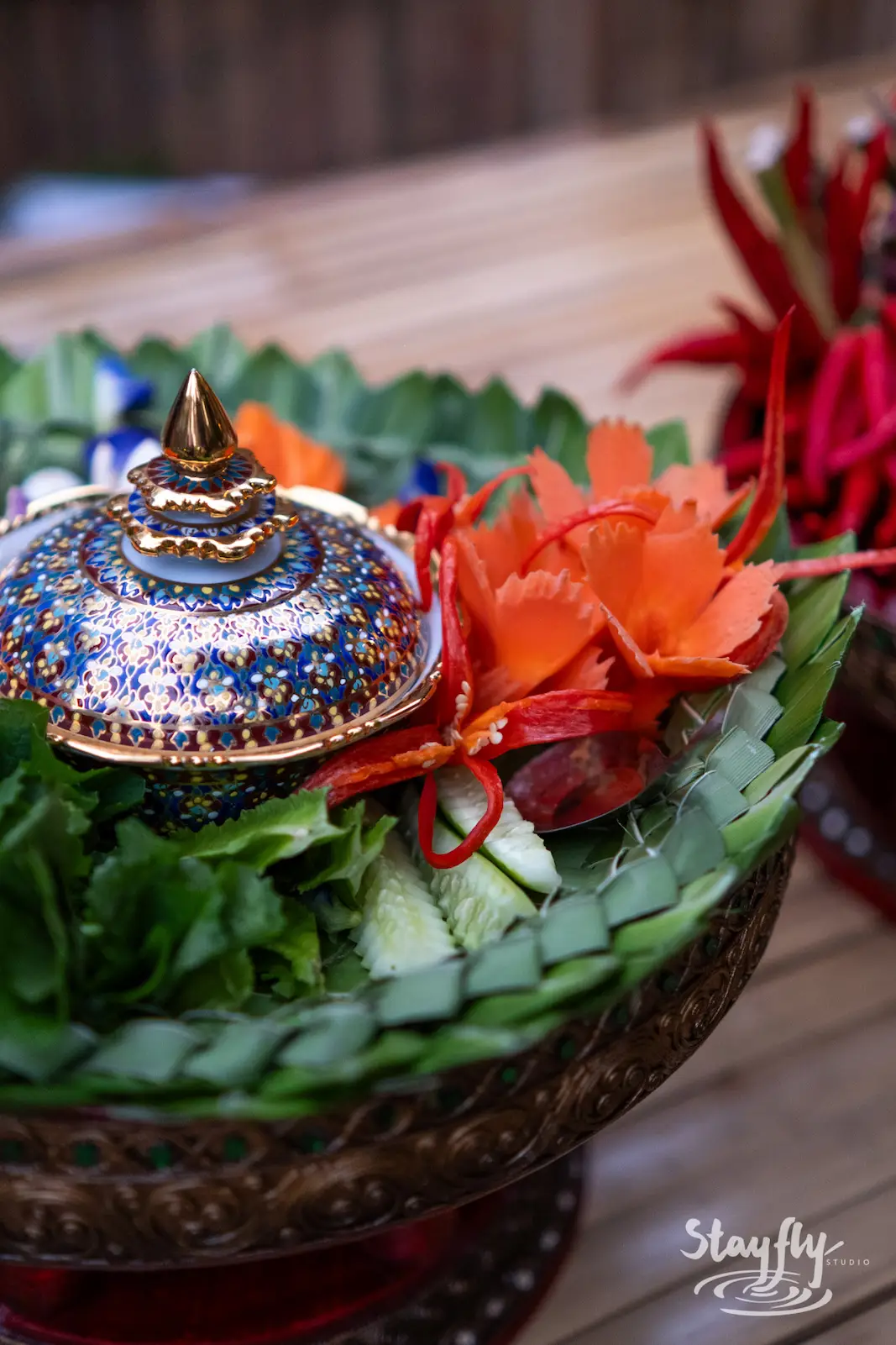 Ceremonial offering bowl with flowers.