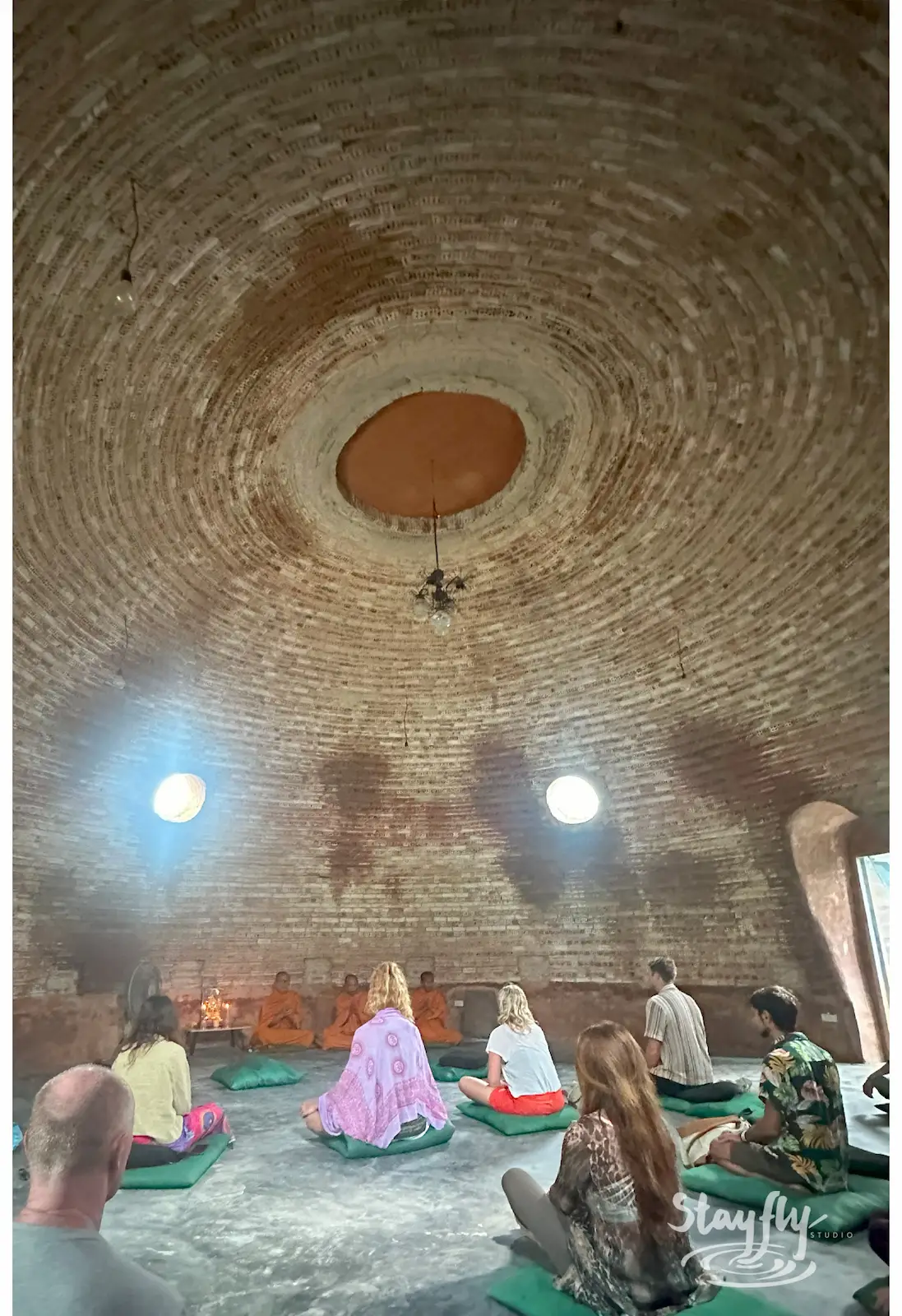 Meditation circle seated inside the dome.