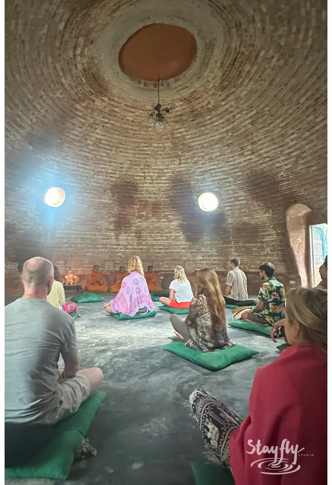 Daytime meditation circle inside the dome.