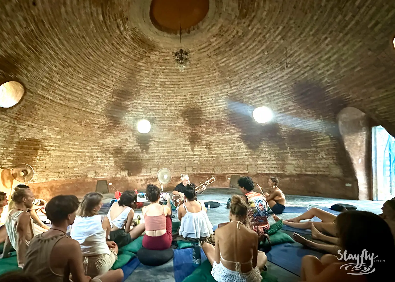 Circle sits inside brick dome for session.