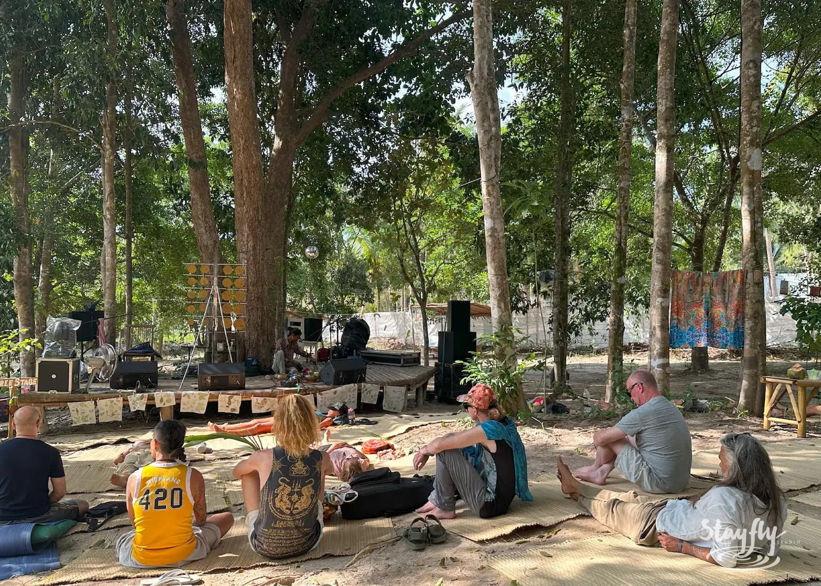 Small daytime circle sits by speaker gear.