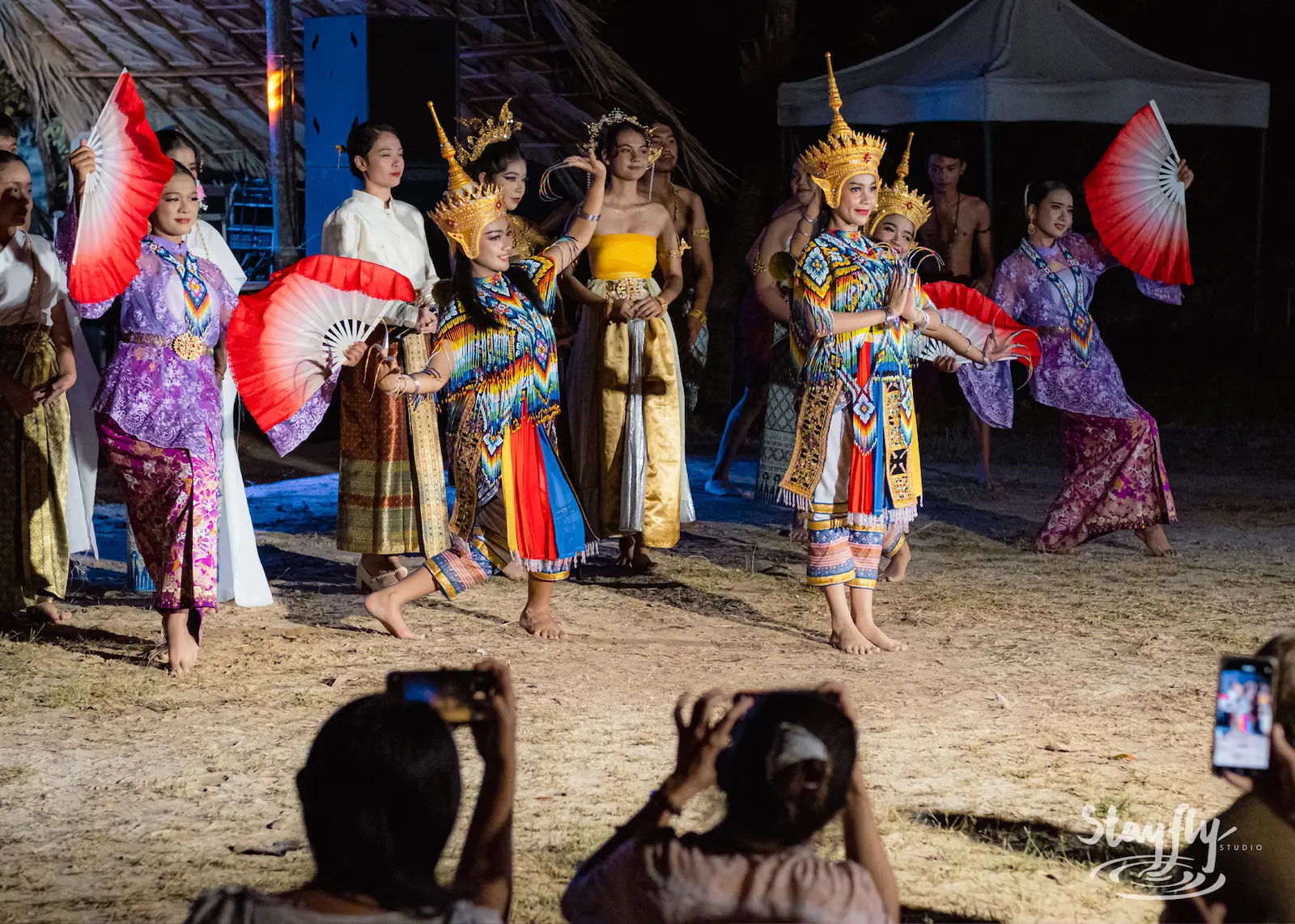 Dancers with fans perform Thai routine.